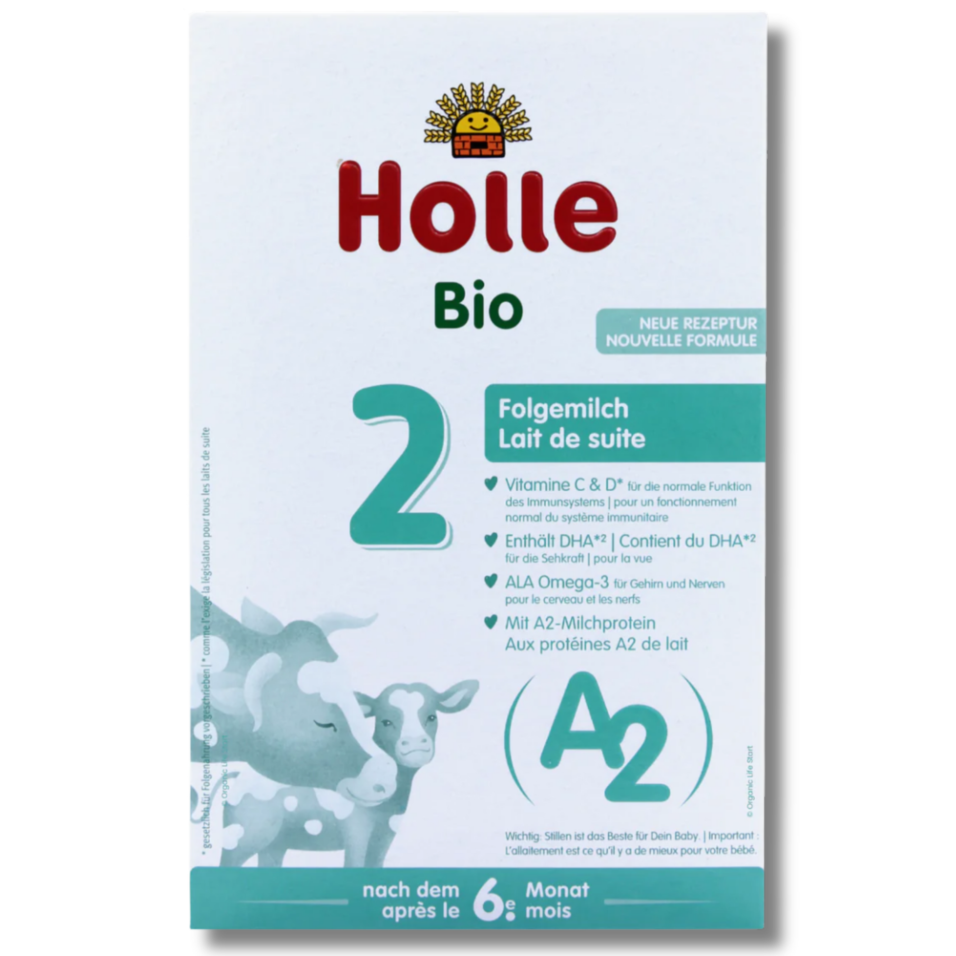 Holle Bio baby formula package with cows on a light blue background
